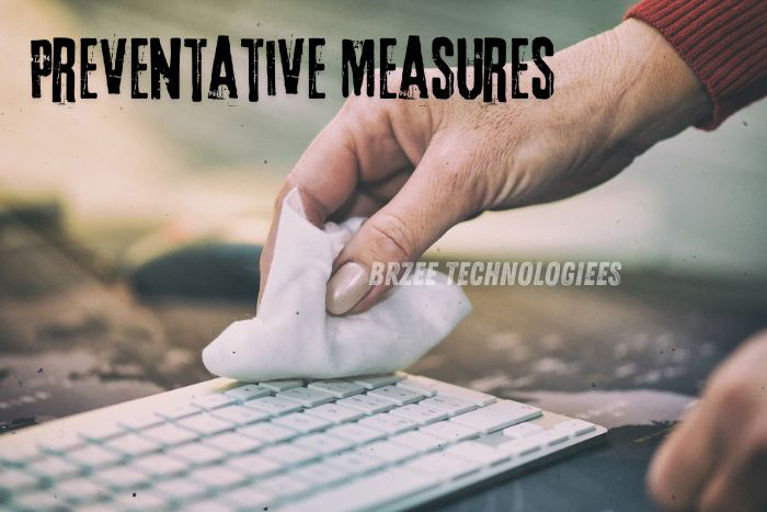 Professional technician at BrZee Technologiees in Gandhipuram, Coimbatore, implementing preventative measures by carefully cleaning a laptop keyboard, demonstrating our commitment to maintaining your device's optimal performance and longevity